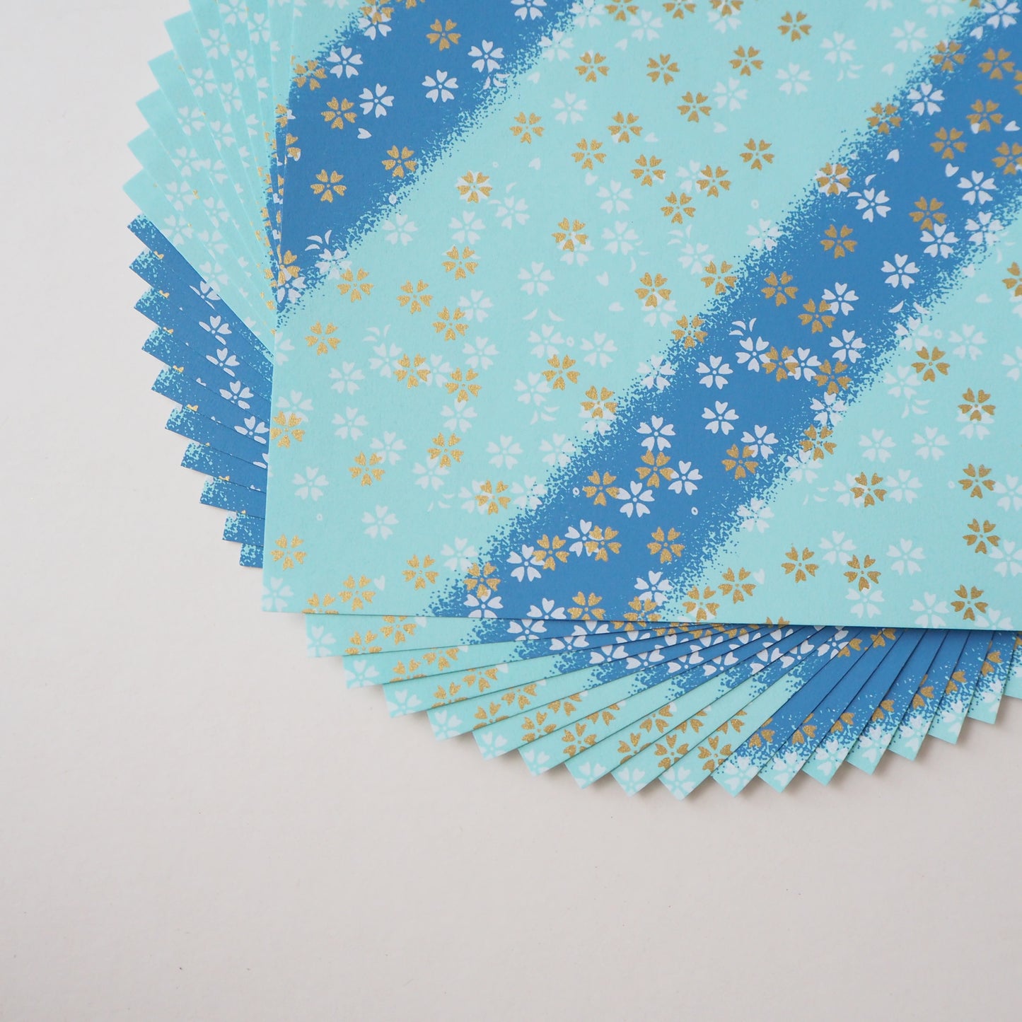 Pack of 20 Sheets 14x14cm Yuzen Washi Origami Paper HZ-467 - Small Cherry Blossom Blue Shades Stripes
