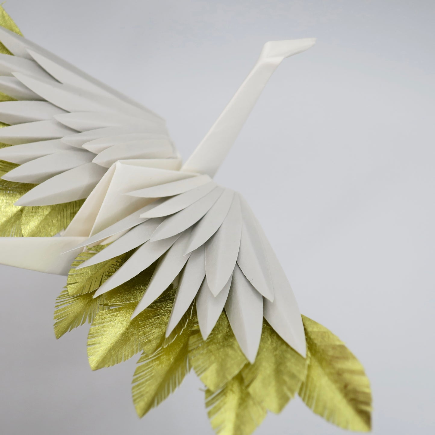 Grue à plumes en origami - Or caché