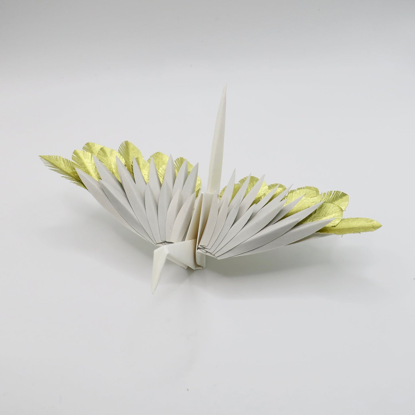 Grue à plumes en origami - Or caché