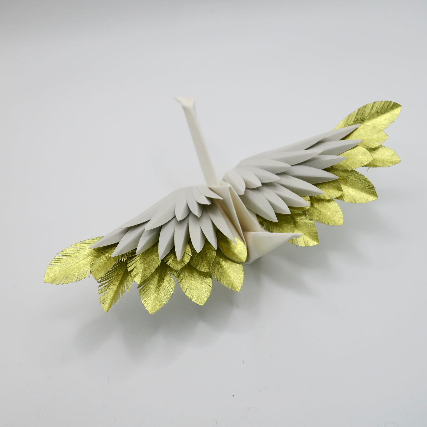 Grue à plumes en origami - Or caché