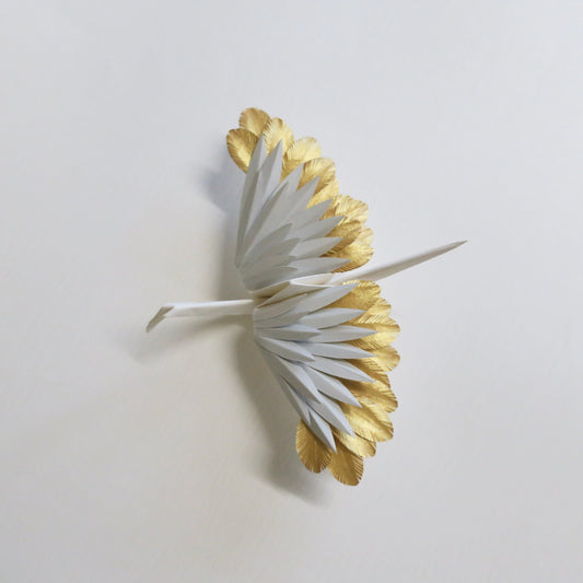 Grulla emplumada de origami - Oro oculto