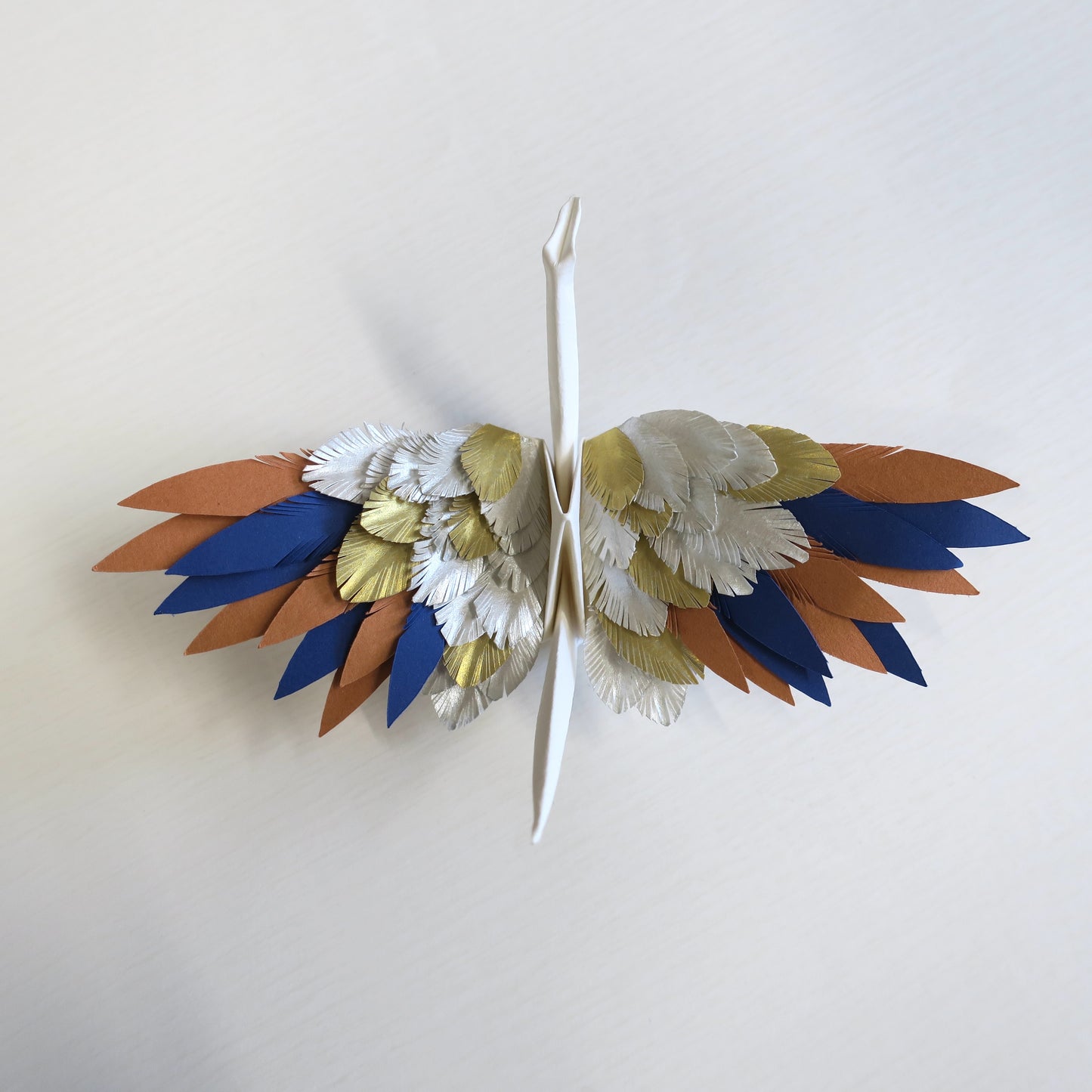 Grulla emplumada de origami - Sol