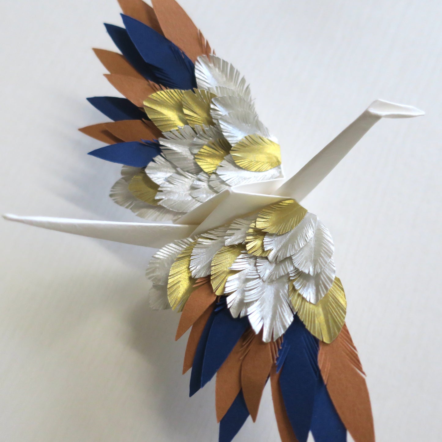 Grulla emplumada de origami - Sol