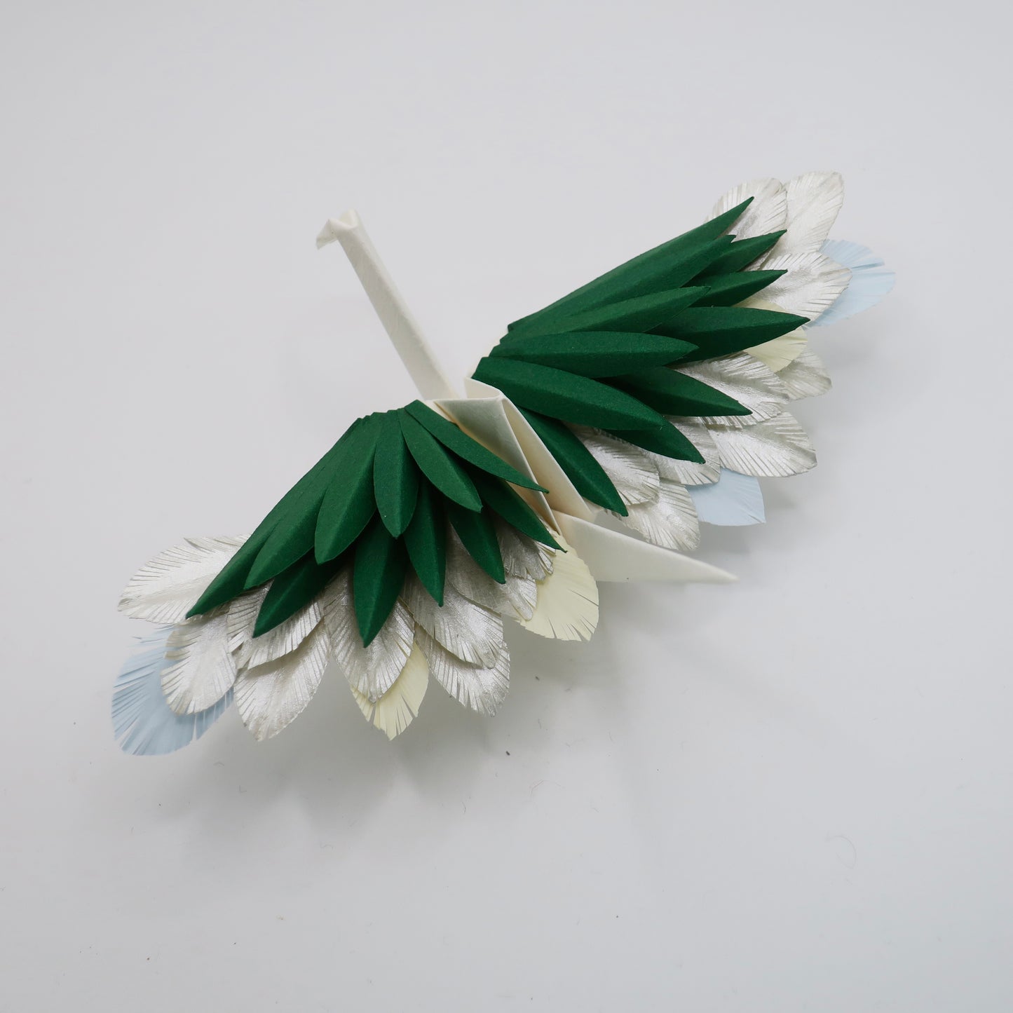 Grulla emplumada de origami - Oro oculto