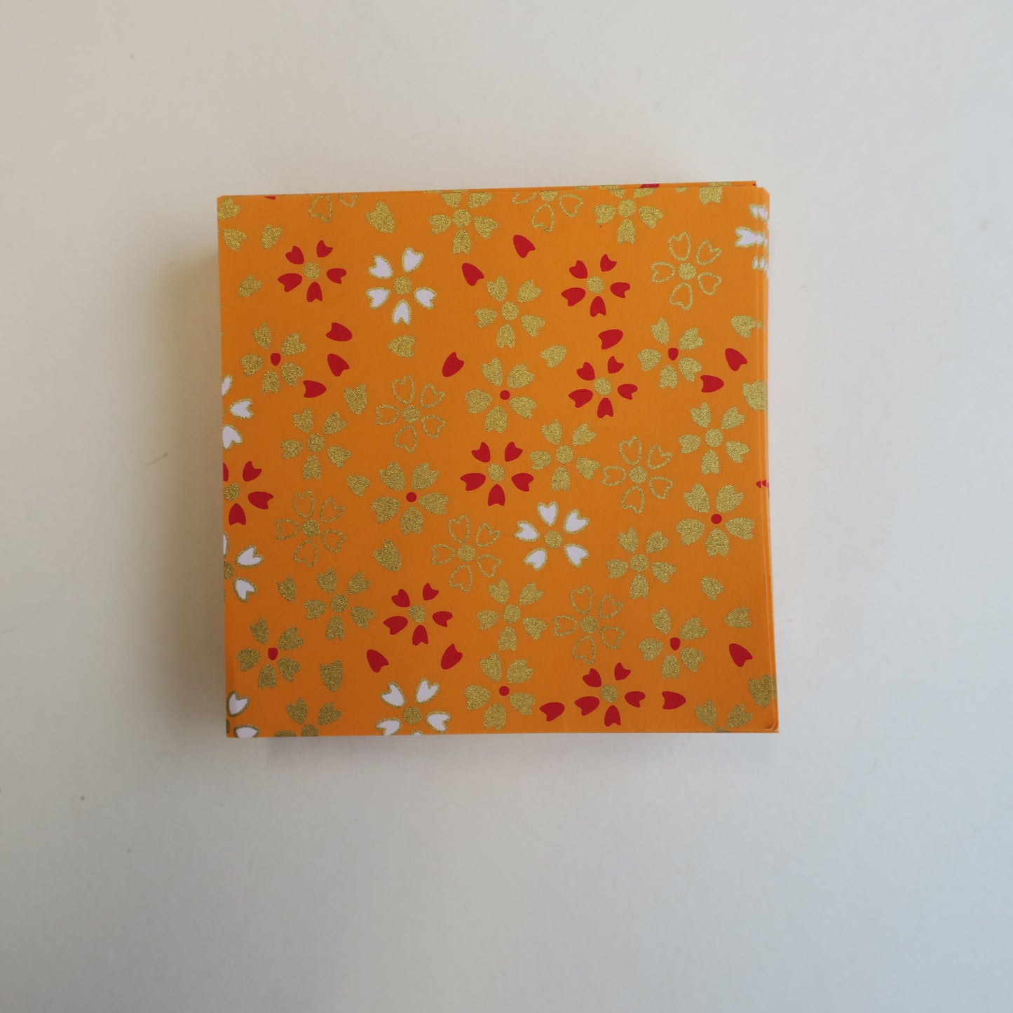 Pack of 100 Sheets 7x7cm Yuzen Washi Origami Paper HZ-488 - Small Cherry Blossom Orange